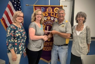 Maryville MO Host Lions Donates to We Gotchya